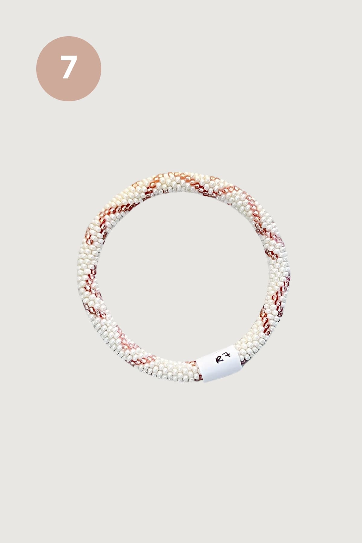 Ivory and rose gold beaded Roll-On bracelet design seven fair trade Nepal - Urban Wild