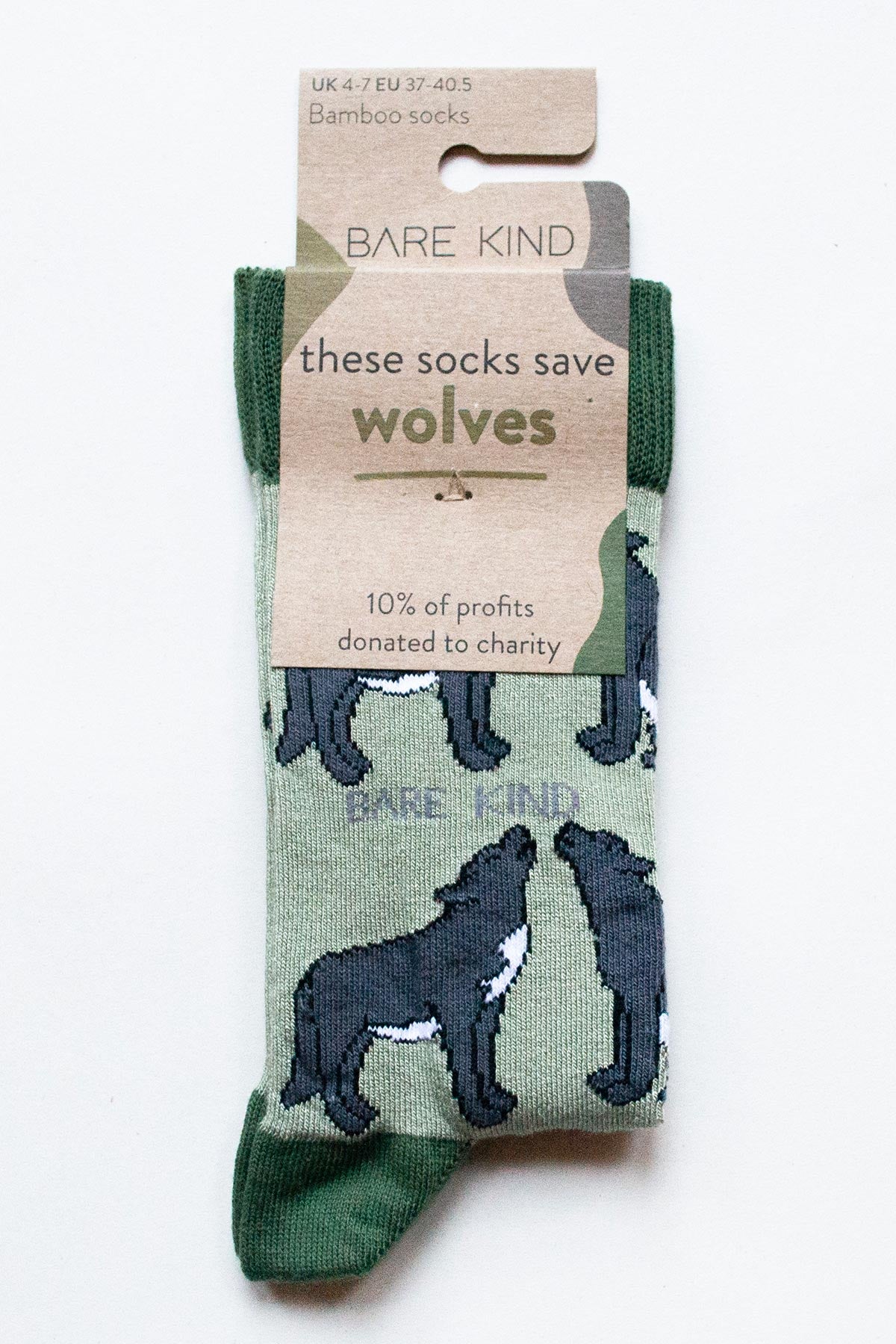 Sage green bamboo crew socks with charcoal wolf design by Bare Kind in plastic-free packaging — Urban Wild