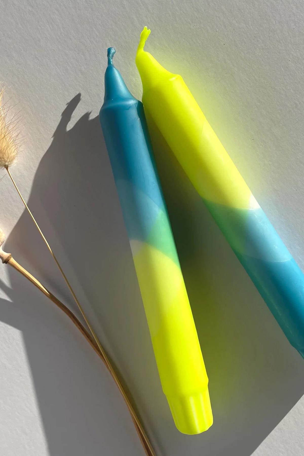 The Singing Rabbit Neon Yellow & Hawaiian Blue Dip Dyed Dinner Candles Set Of 2