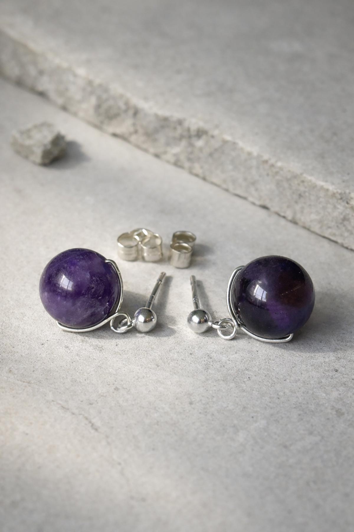 Amethyst stud earrings detail view