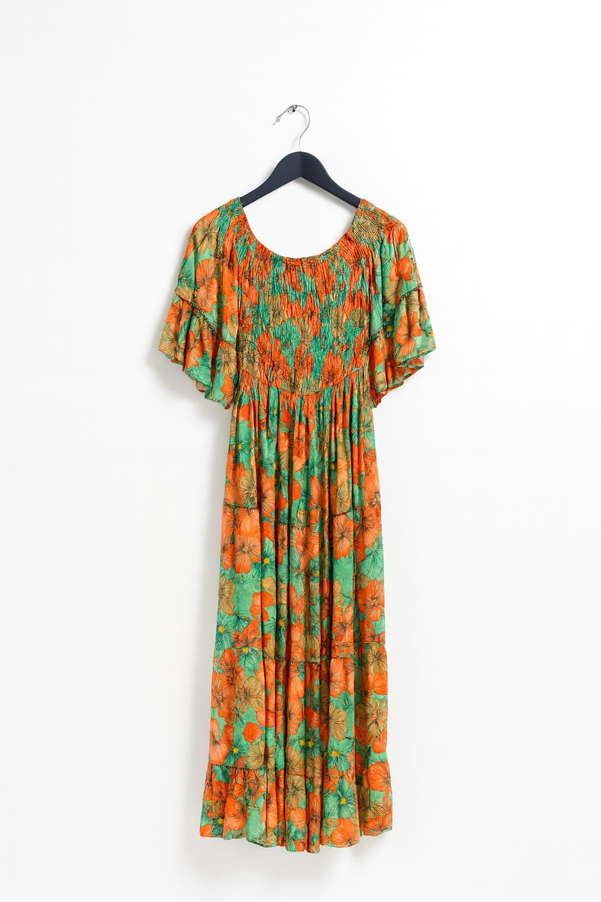 Close-up of Anemone Fields Silk Blend Maxi Dress showing silk texture and smocked bodice