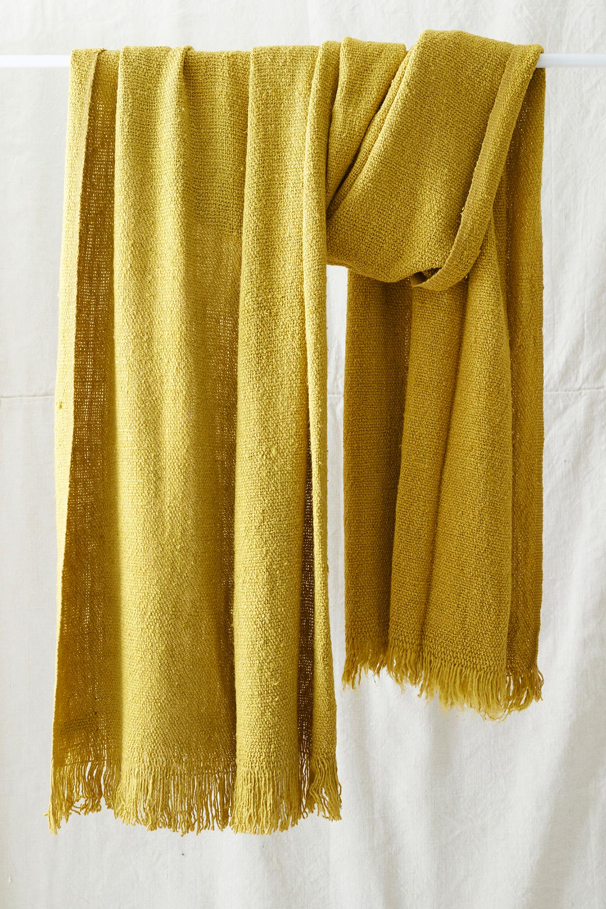 Aura Que Bibek banana yarn scarf in mustard yellow