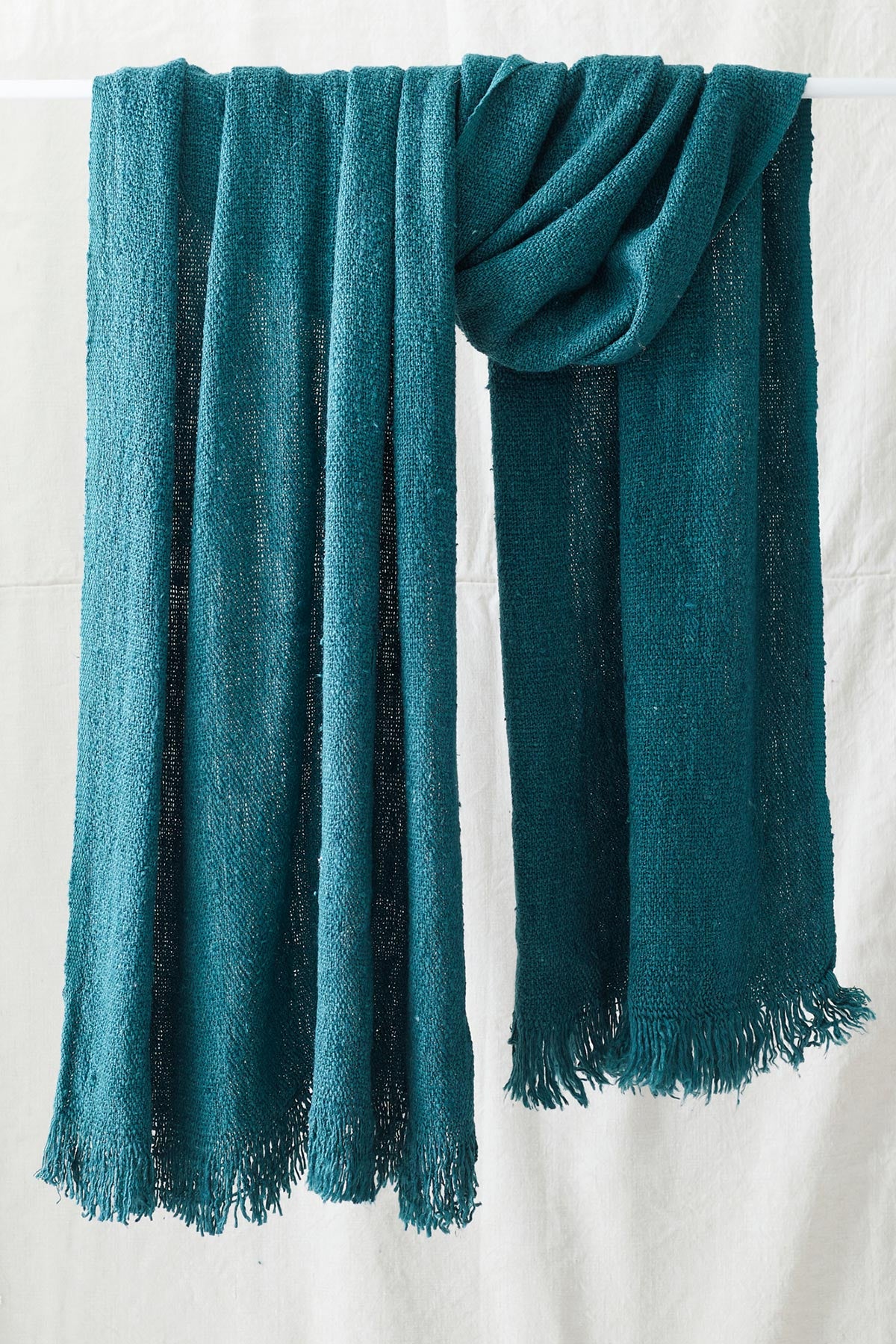 Aura Que Bibek banana yarn scarf in teal green