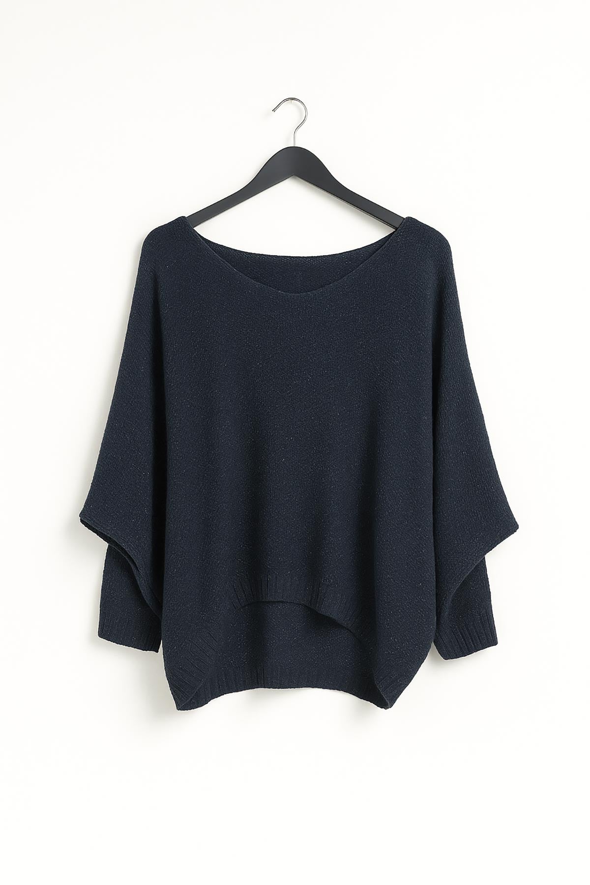 Close-up of Aurora knit top in navy showing soft lurex shimmer and texture
