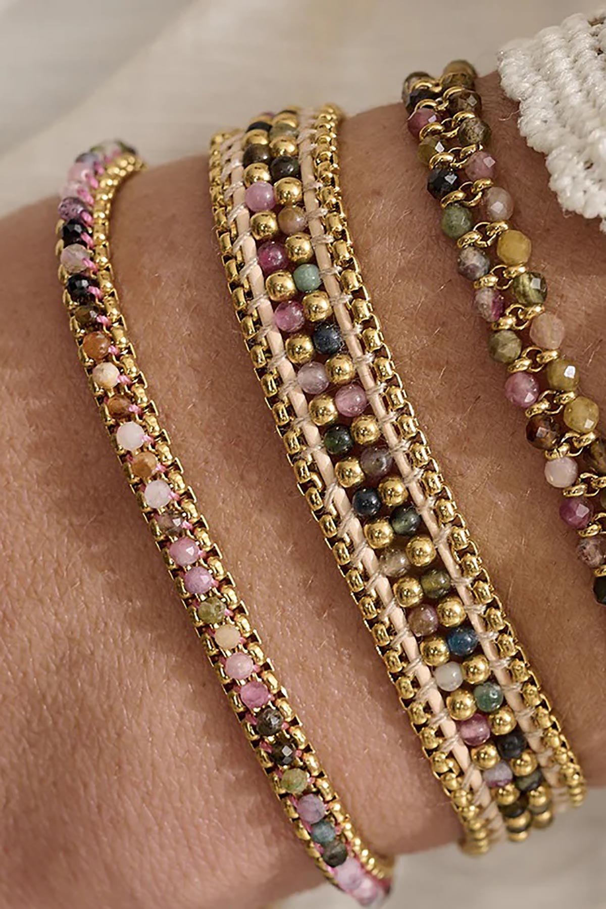 Zena bracelet worn layered on wrist