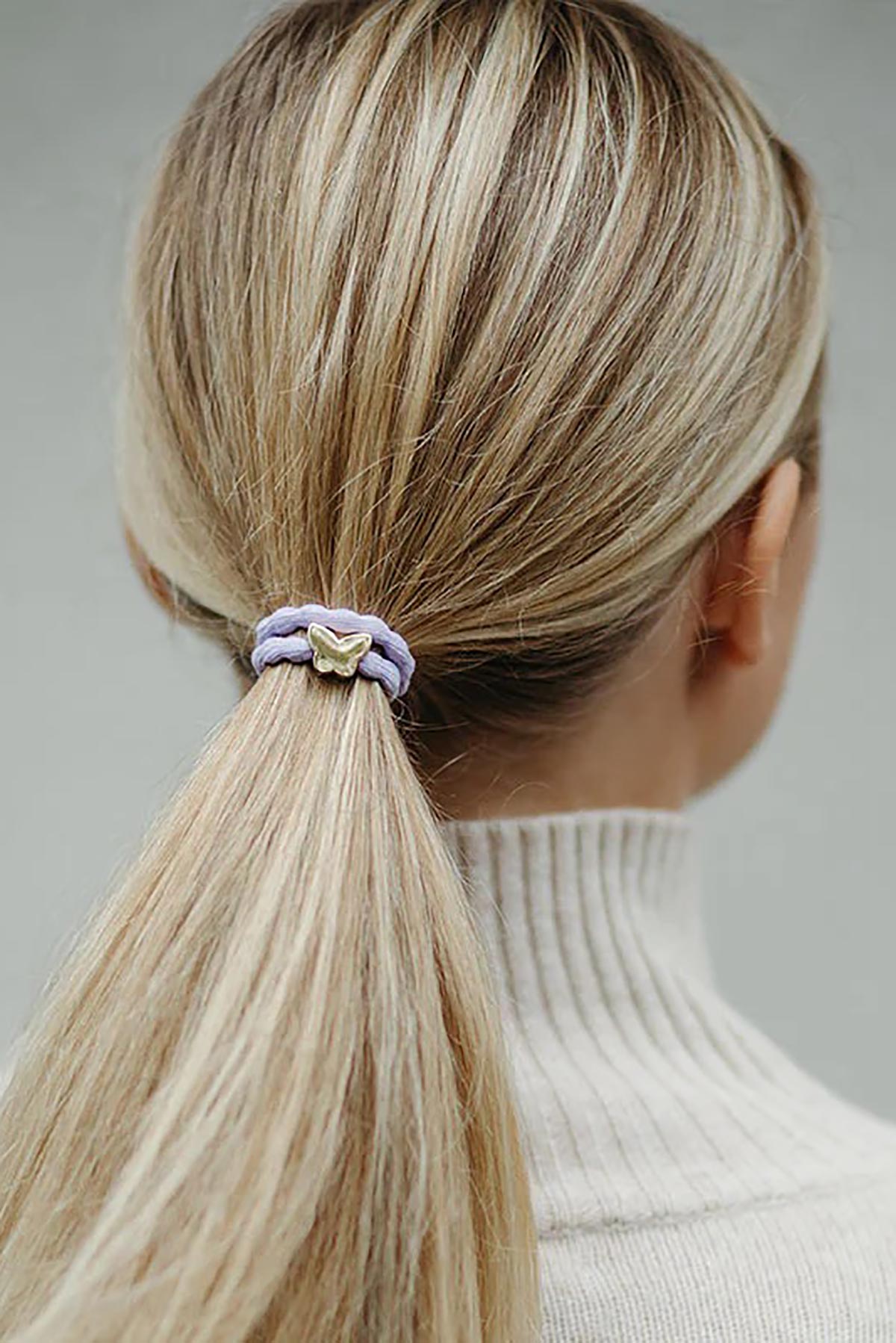 By Eloise lavender Bangle Band used as a stylish everyday hair tie