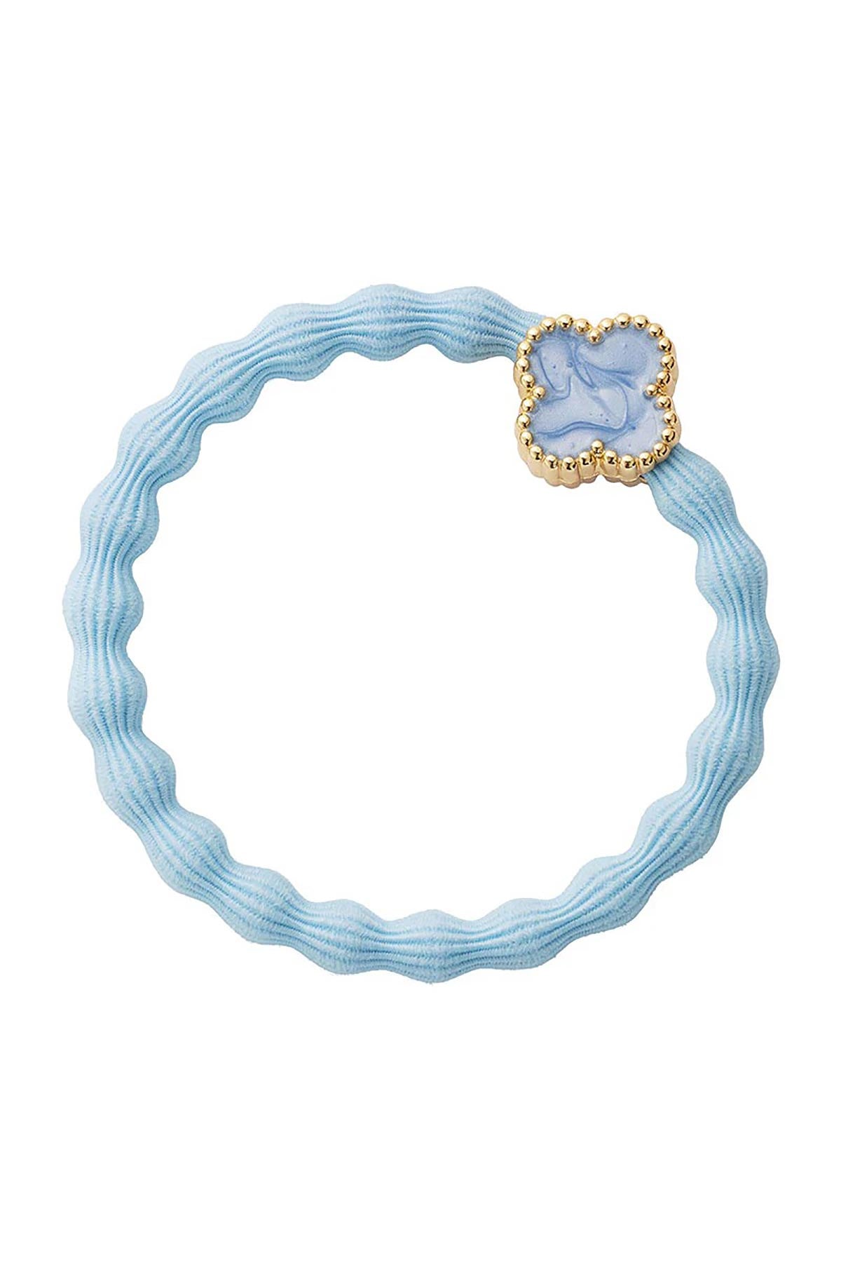 By Eloise Sky Blue Gold Quatrefoil Enamel Bangle Band shown as an elegant hair tie bracelet