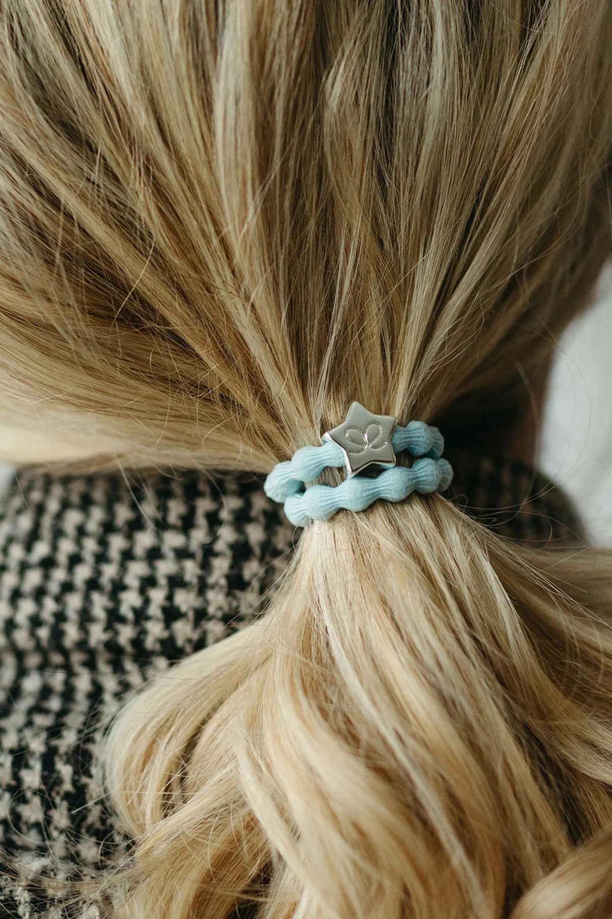 By Eloise sky blue Bangle Band used as a stylish everyday hair tie