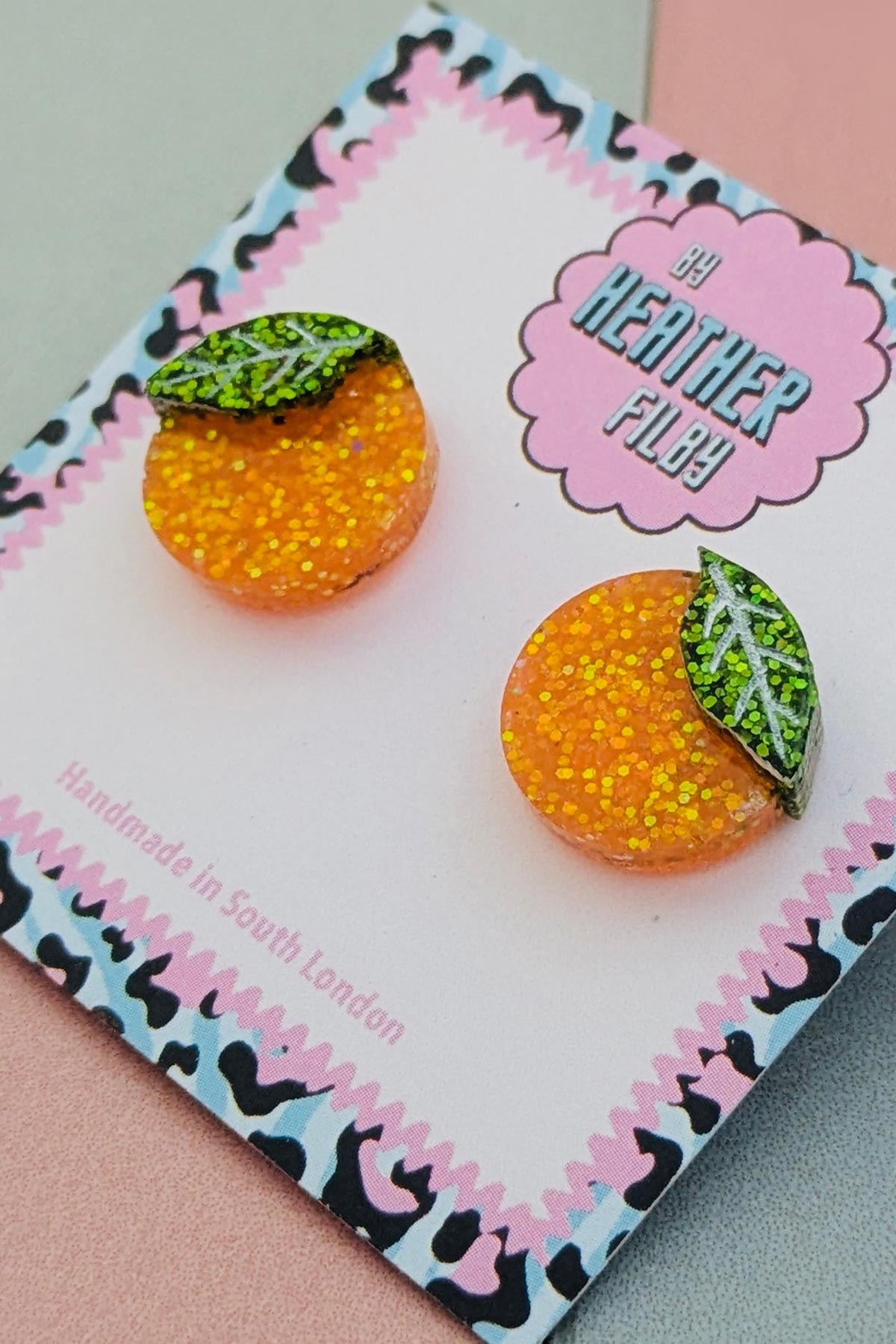 Orange glitter stud earrings