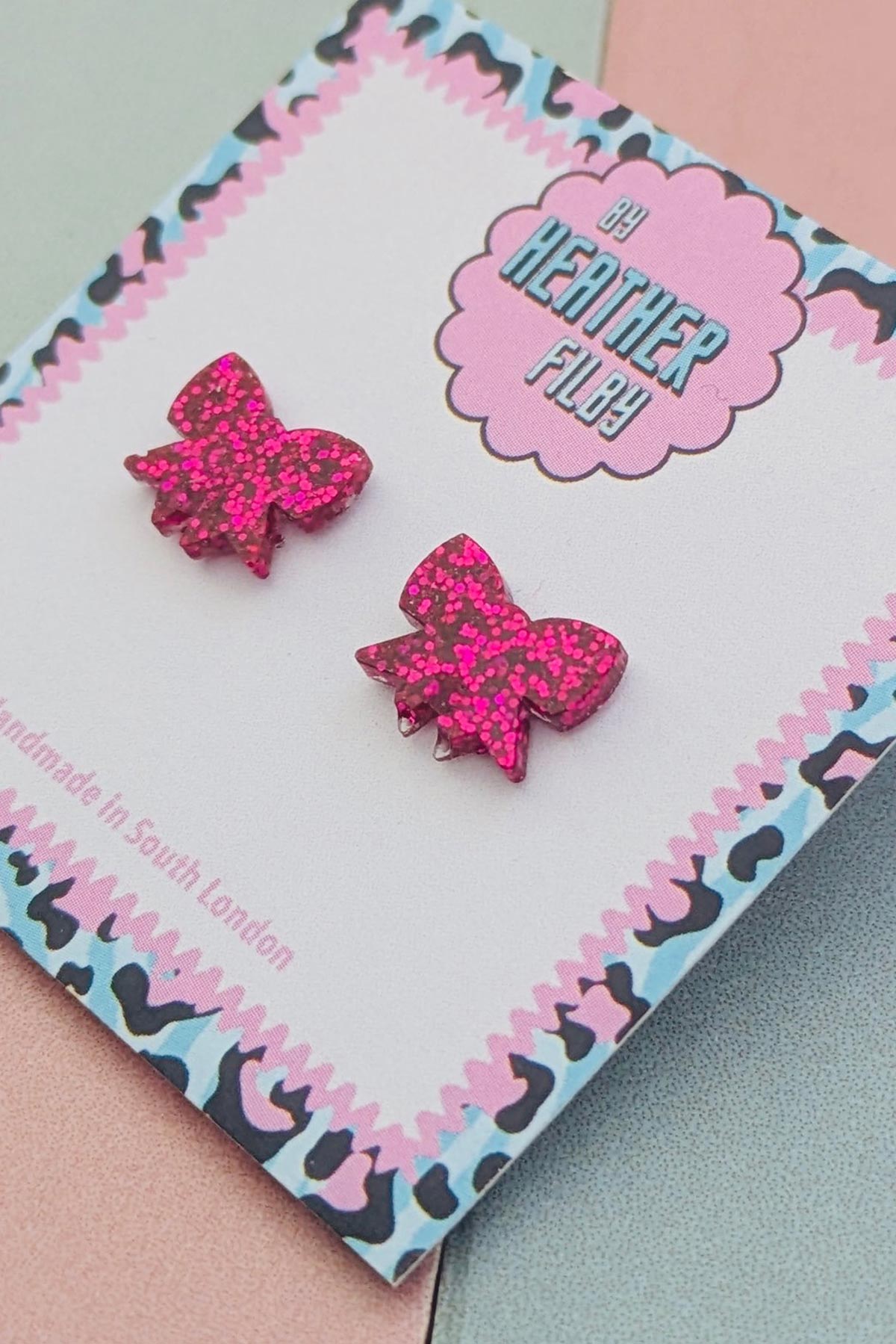 Pink bow glitter stud earrings