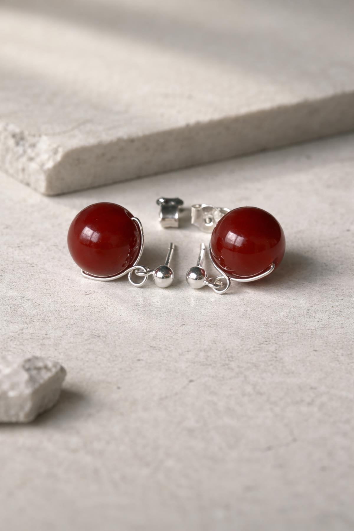Carnelian stud earrings detail view
