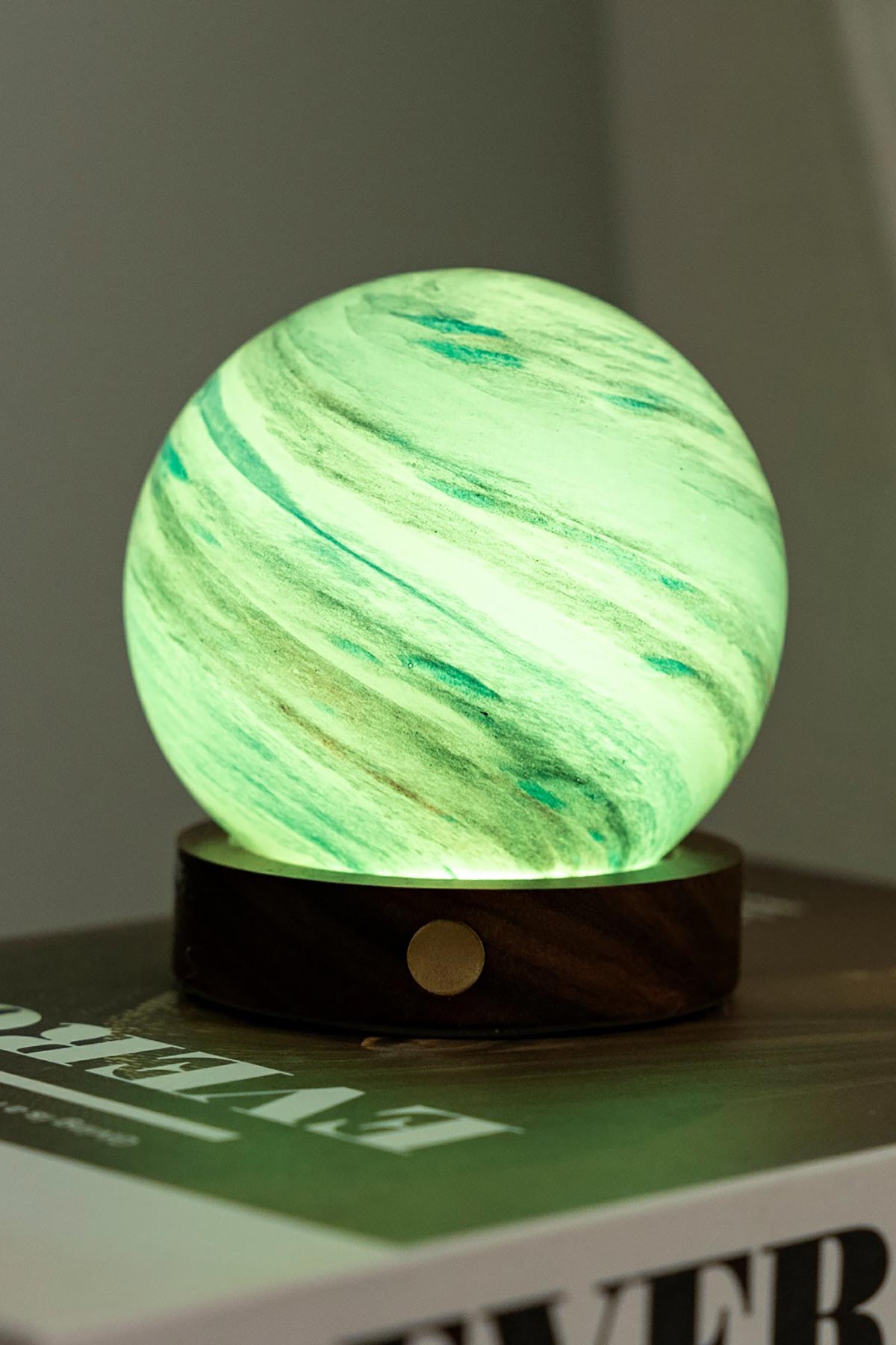 Glowing cloud-like glass light in Polar Cloud design light green