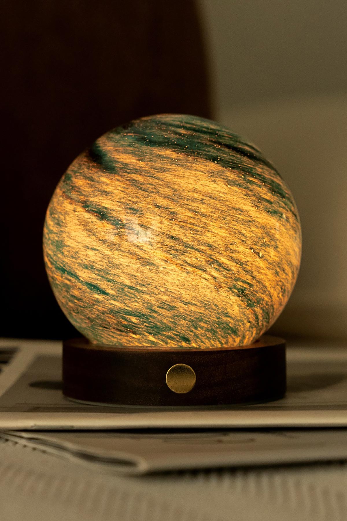 Illuminated yellow Stellar Ocean LED glass orb