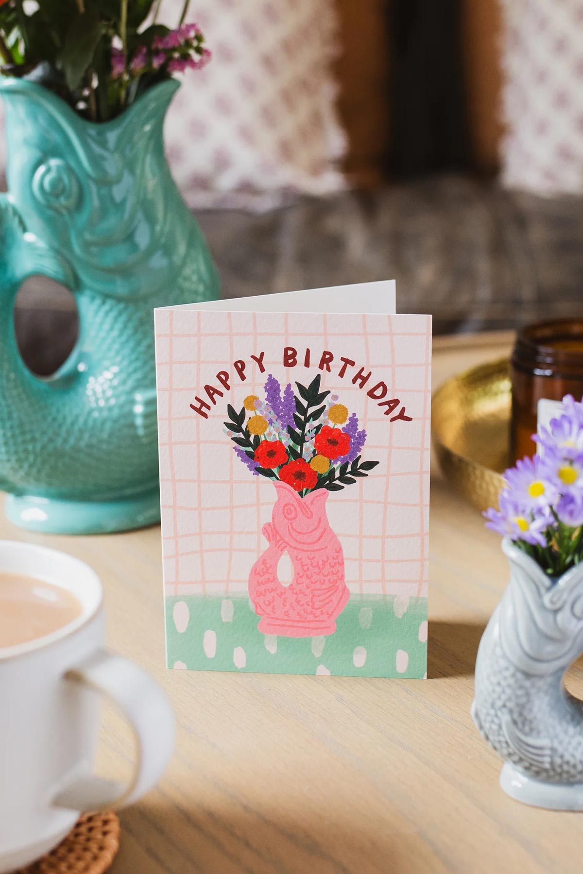 Gluggle Jug Happy Birthday card with floral illustration on pink jug lifestyle
