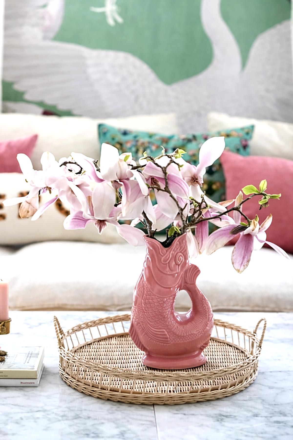 Pink Gluggle Jug styled as a decorative vase in a home setting
