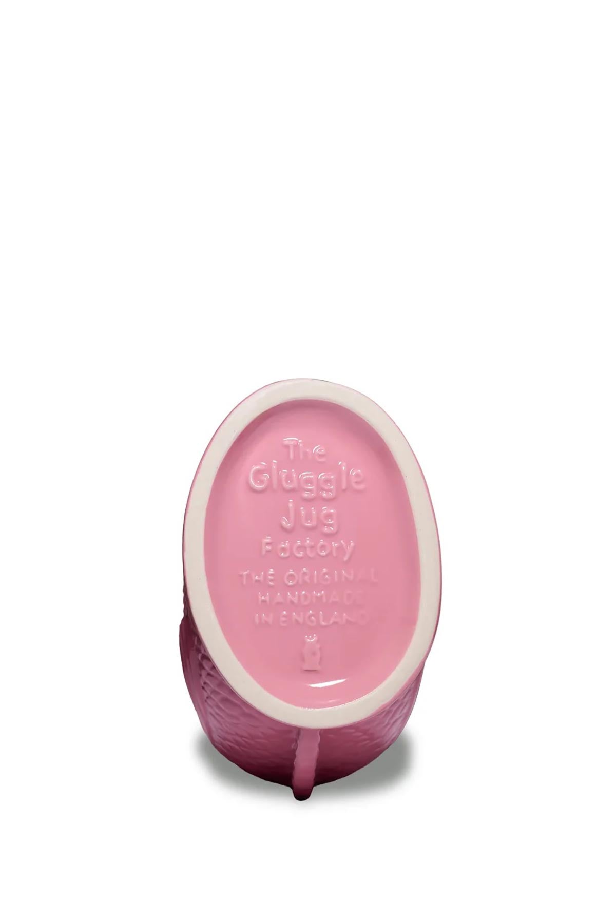 Side view of pink ceramic Gluggle Jug with smooth glazed finish