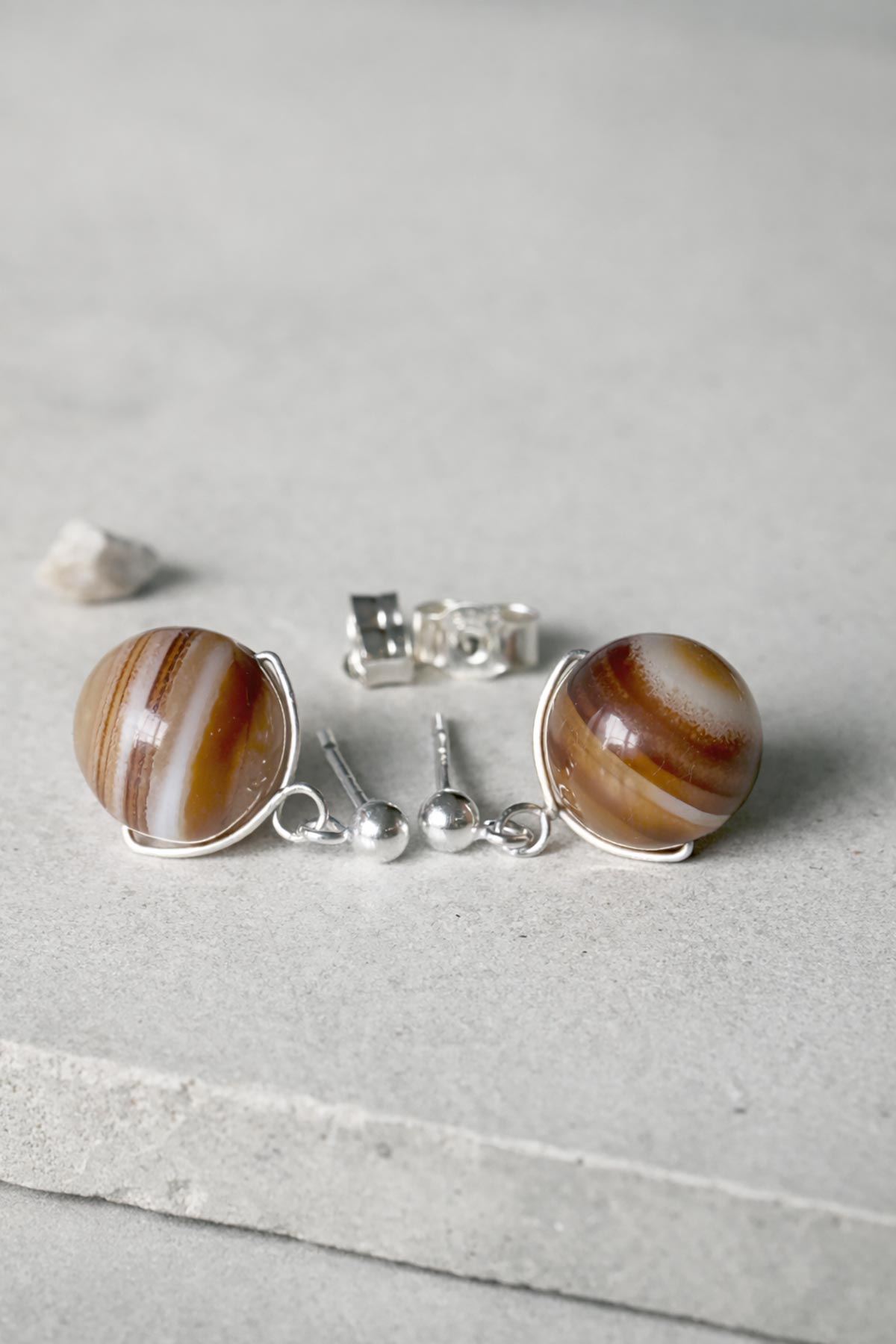 Golden brown agate stud earrings detail view