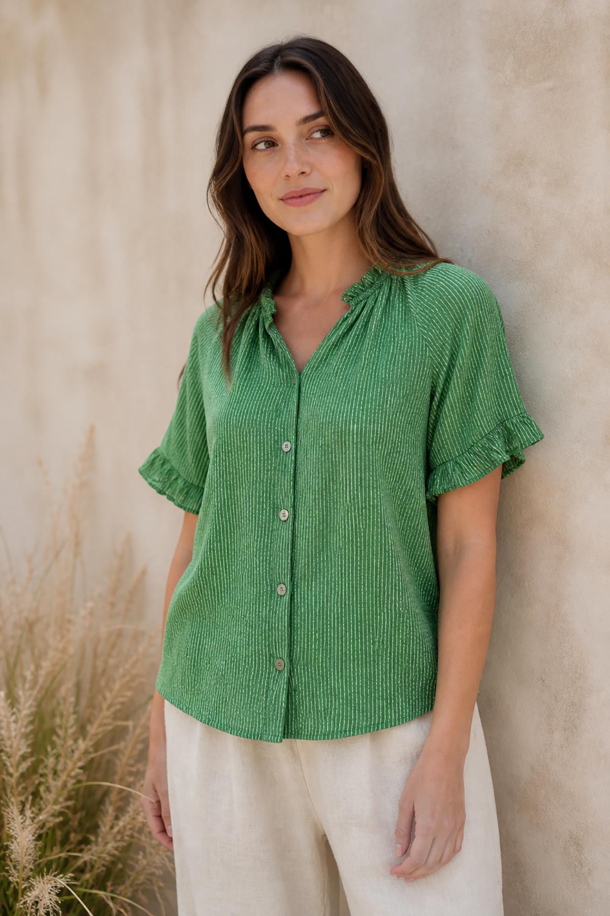 Detail view of green stripe cotton gypsy top with relaxed fit