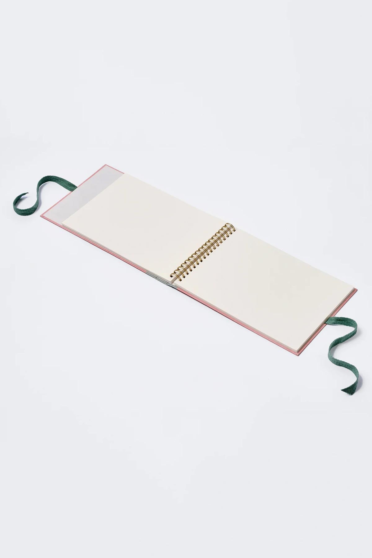 Roomytown sketchbook styled on desk