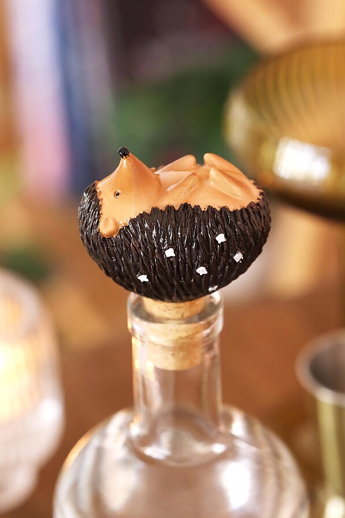 Hedgehog bottle stopper placed in glass bottle