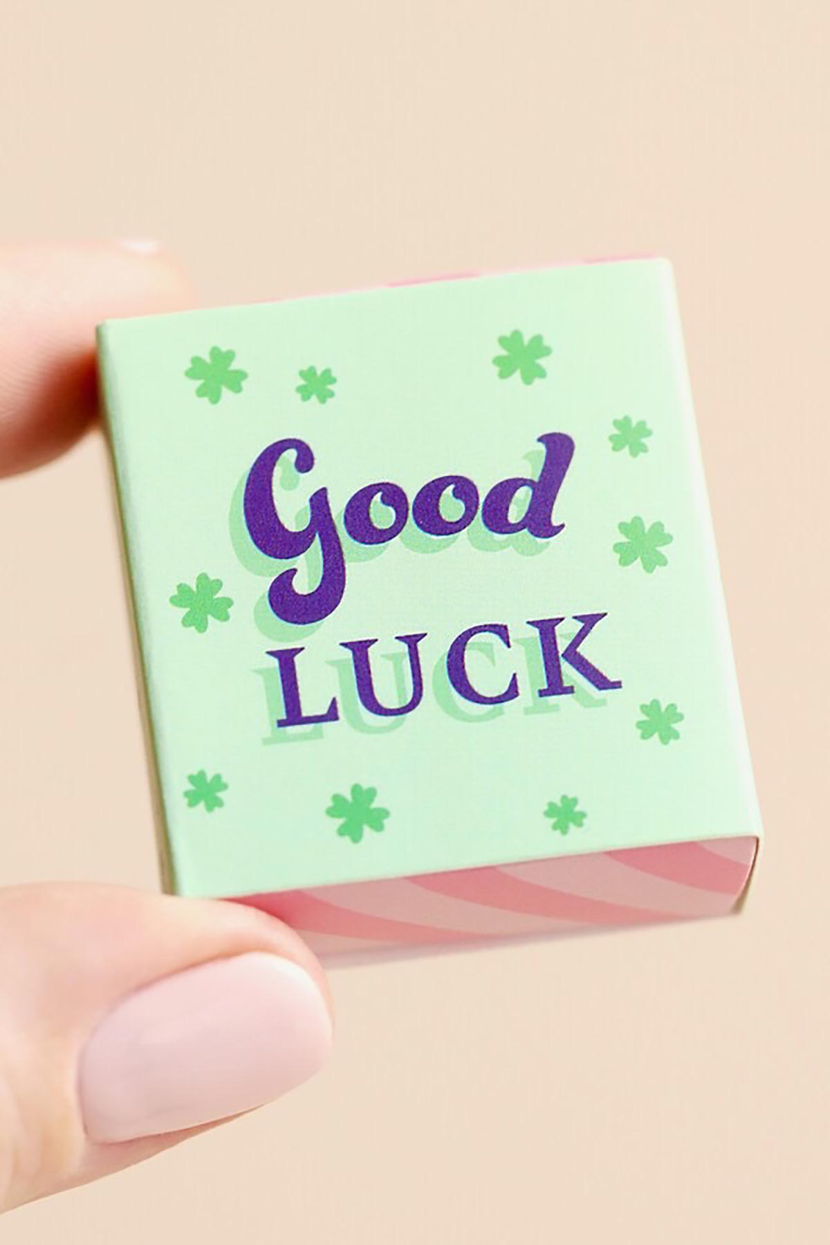 Clover ceramic token styled as a gift