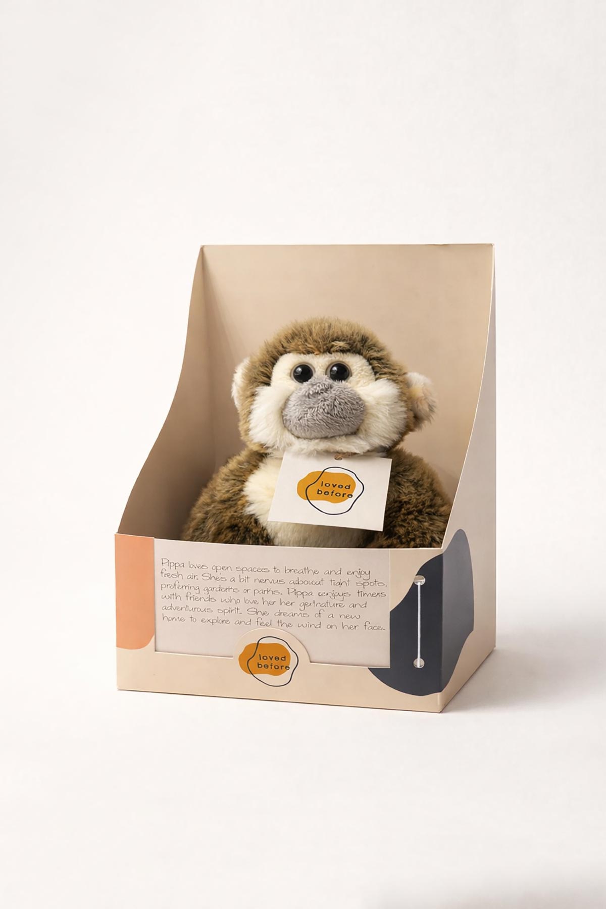Pippa pre-loved monkey soft toy by Loved Before in presentation box at Urban Wild.
