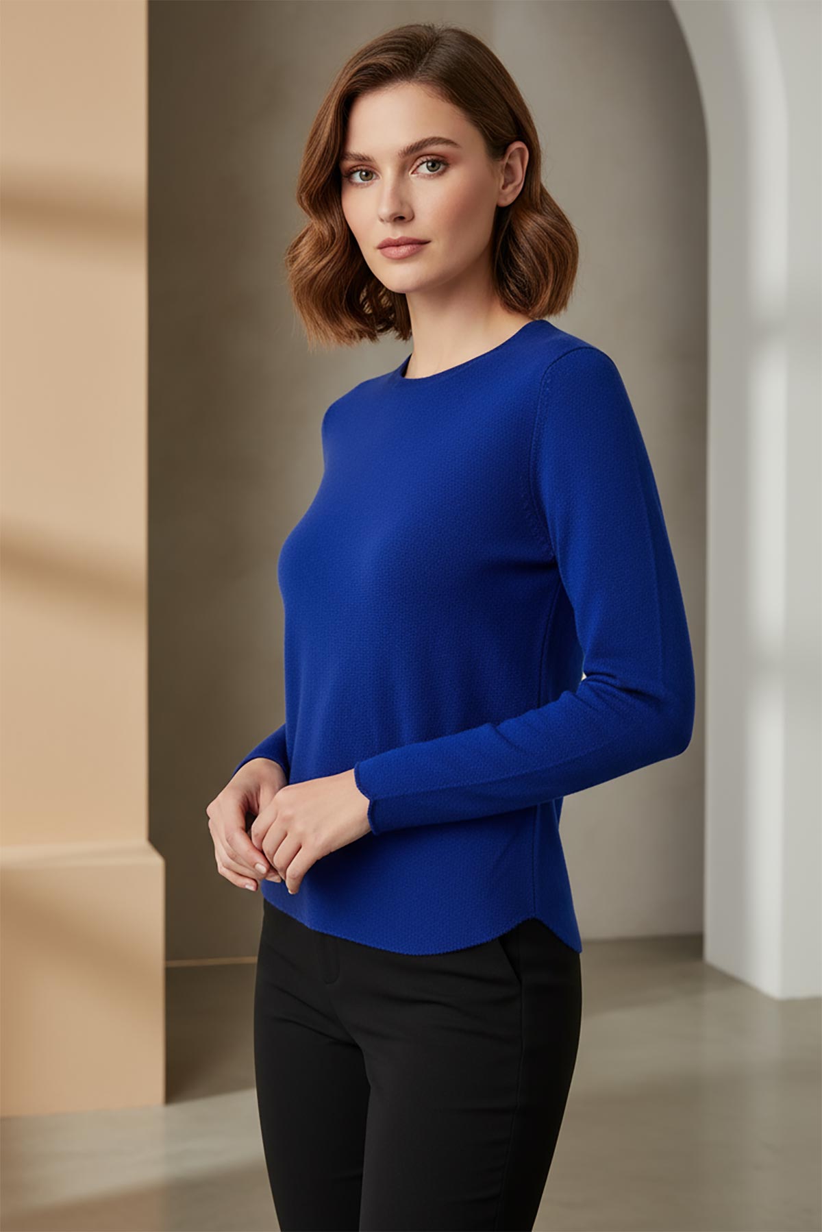 Model wearing royal blue reversible seamless knit jumper made in Italy – elegant Italian knitwear by Urban Wild