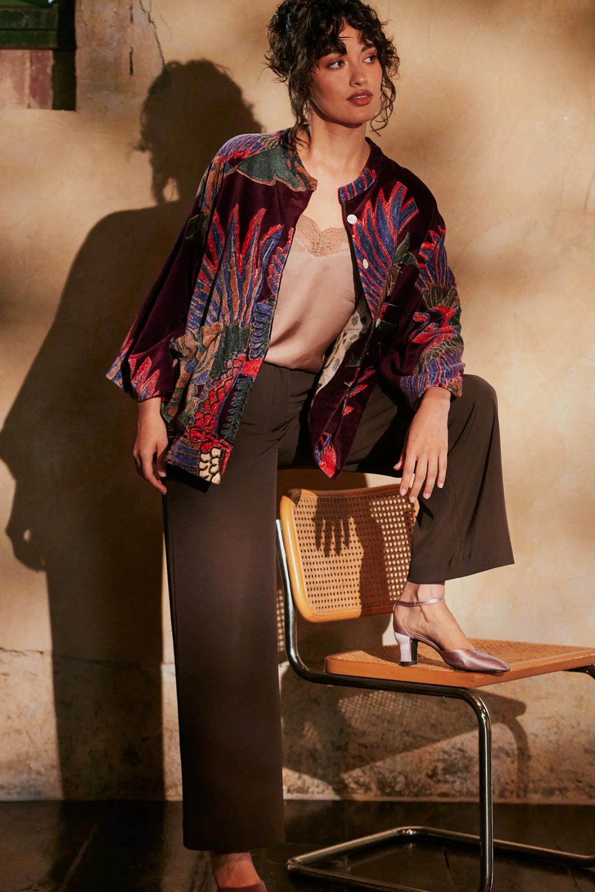 Model wearing Crane Plum Velvet Jacket