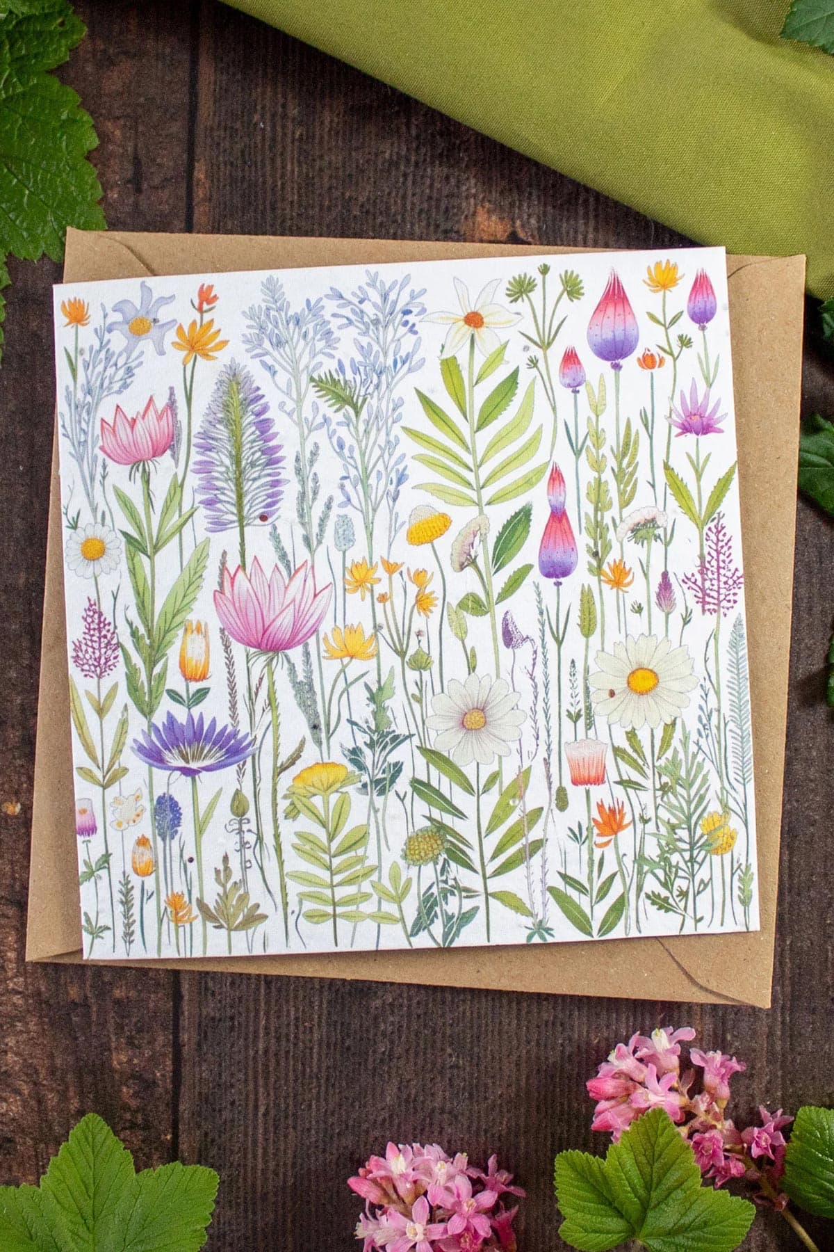 Plantable greetings card with floral collage design