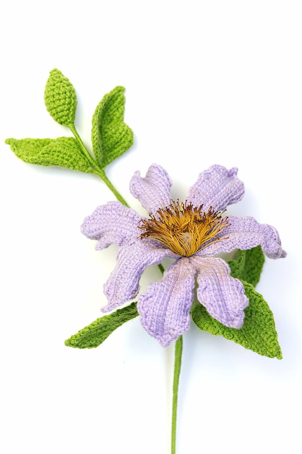 Purple clematis crochet flower stem handmade in cotton yarn, styled for natural home décor at Urban Wild