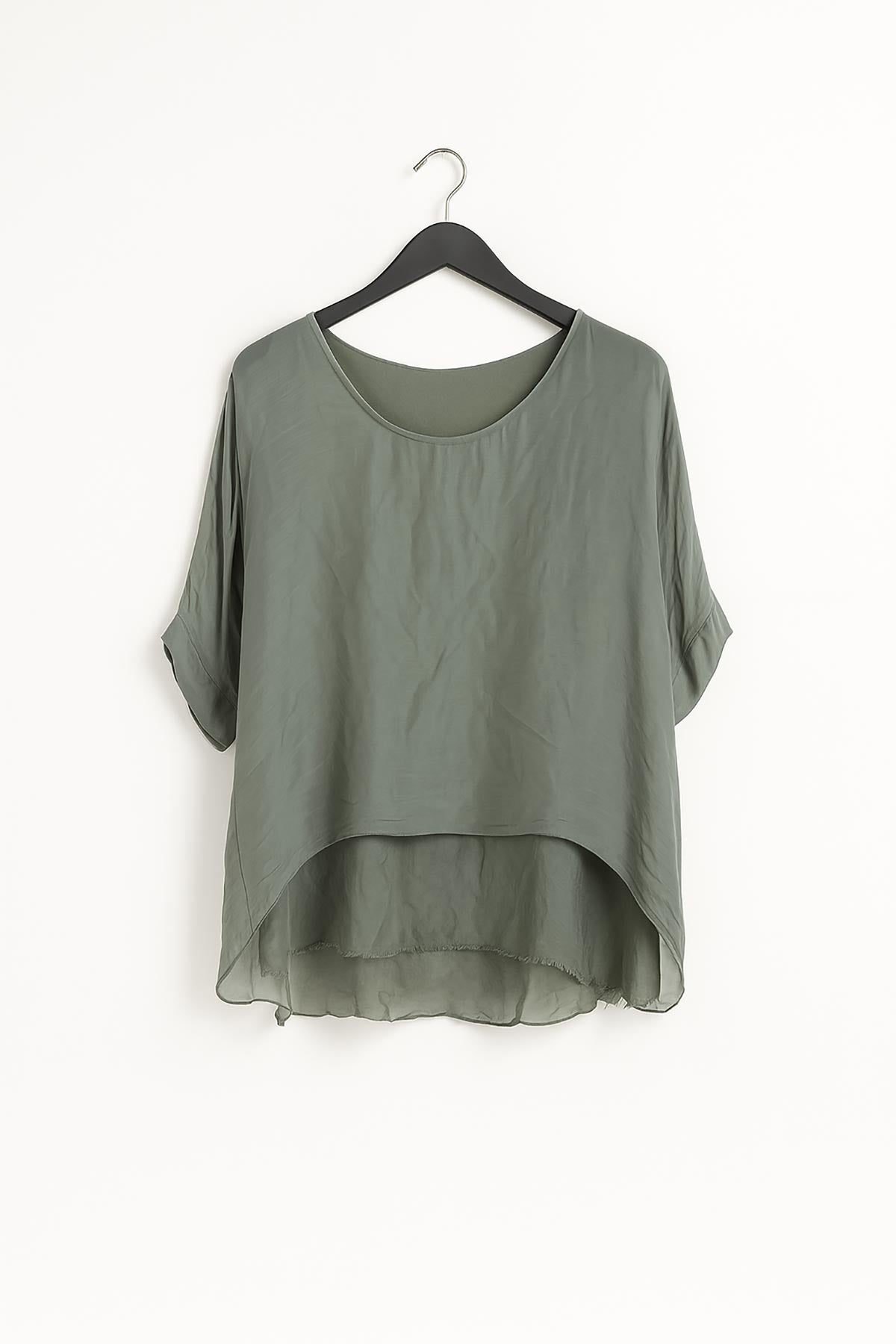 Close-up of Seren Silk Blend Top showing lightweight silk fabric and frayed edge