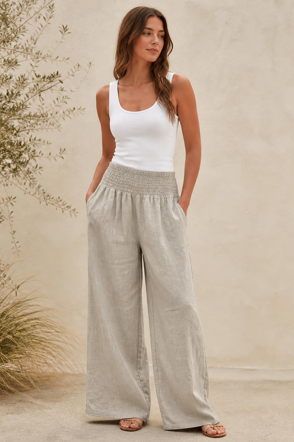 Detail view of stone linen wide leg trousers by Urban Wild