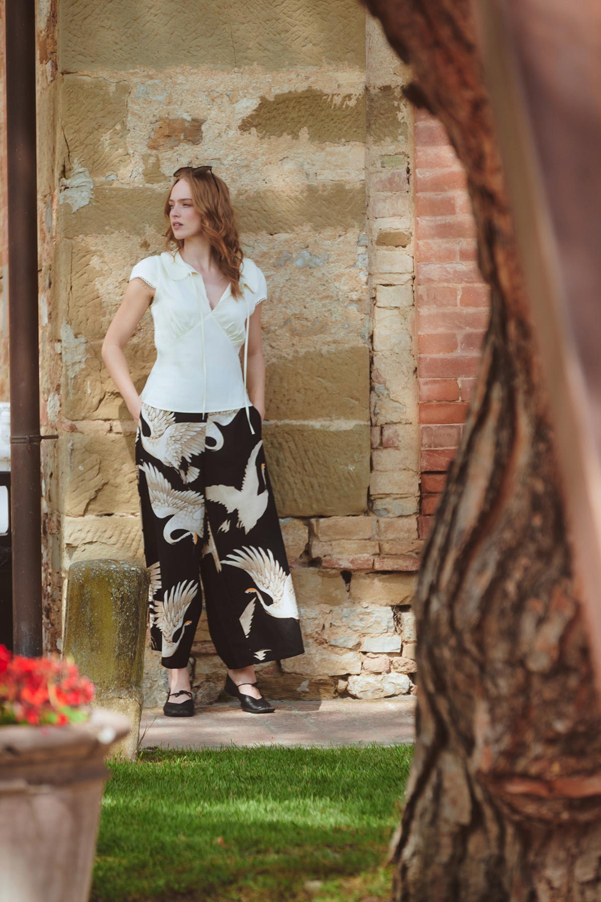 Black stork print Ecovero viscose cotton trousers