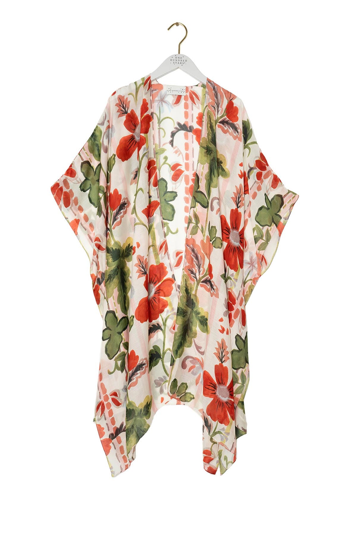 Close-up detail of poppy red print throwover by One Hundred Stars – available at Urban Wild