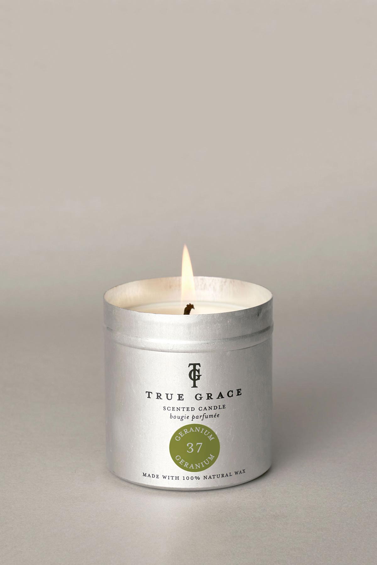 Detail of True Grace Geranium Tin Candle showing wax