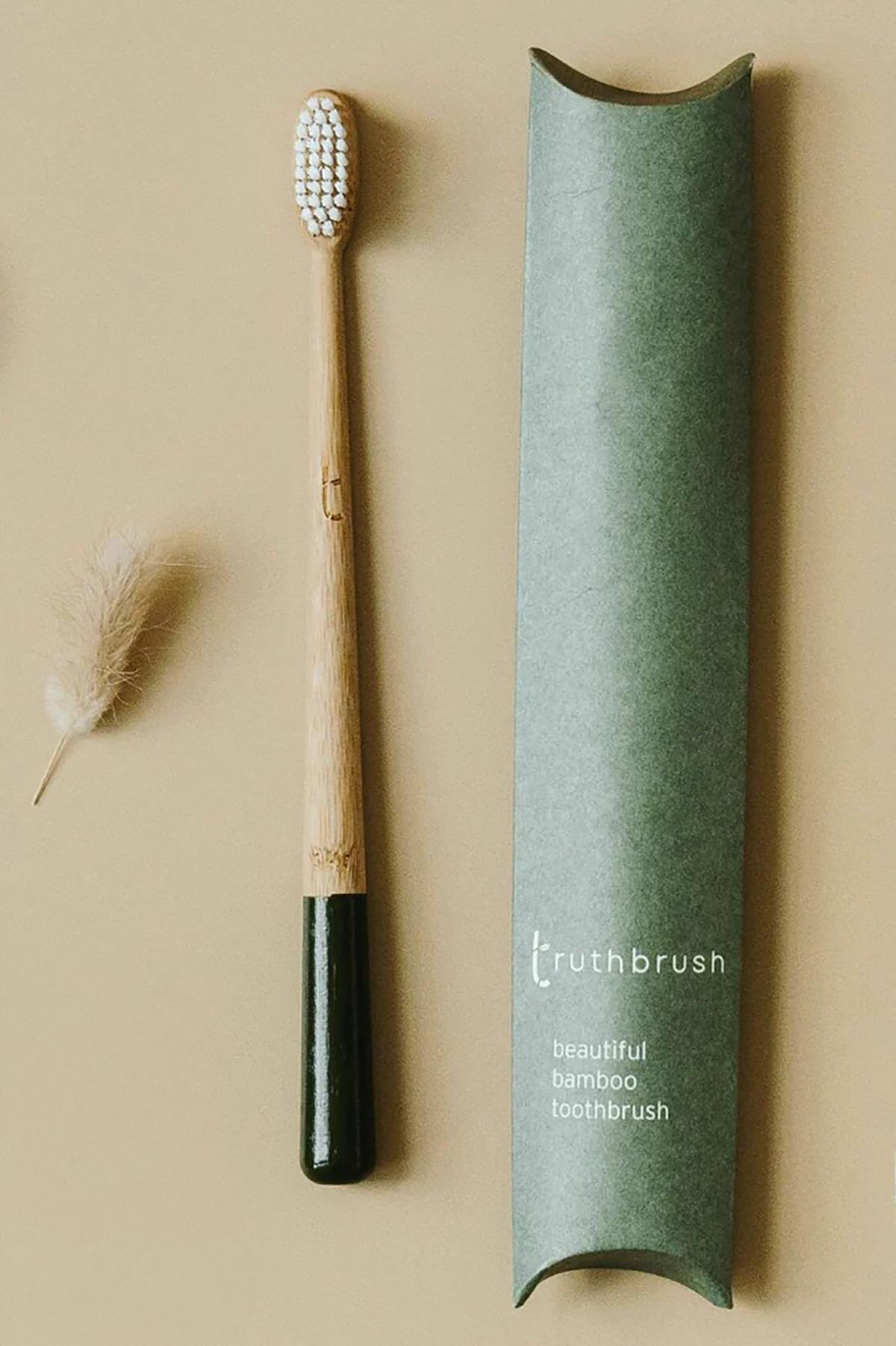 Green bamboo toothbrush by Truthbrush
