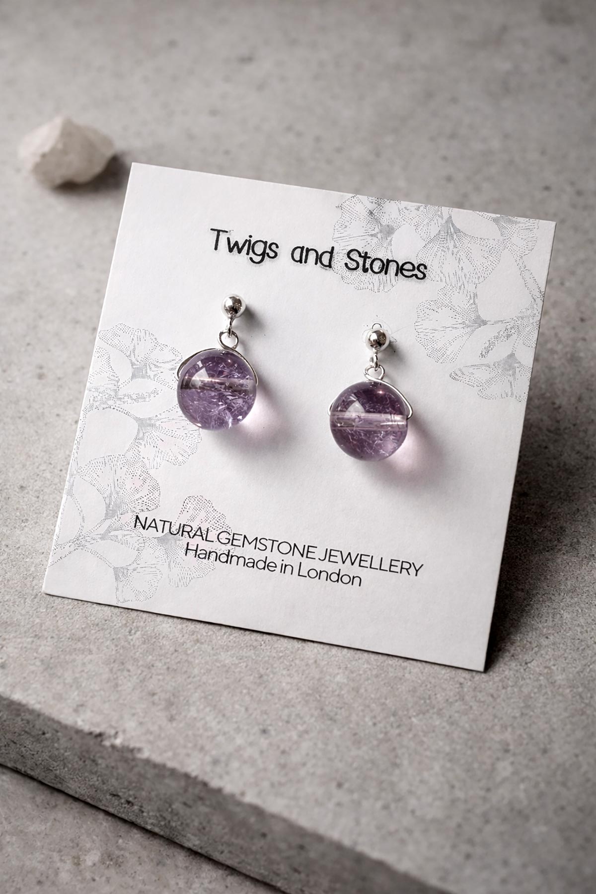 Close-up of ametrine gemstone stud earrings