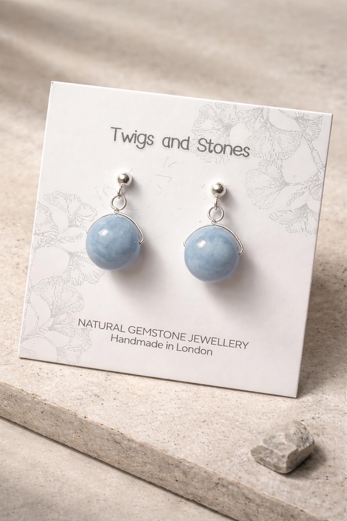 Twigs & Stones angelite earrings in packaging
