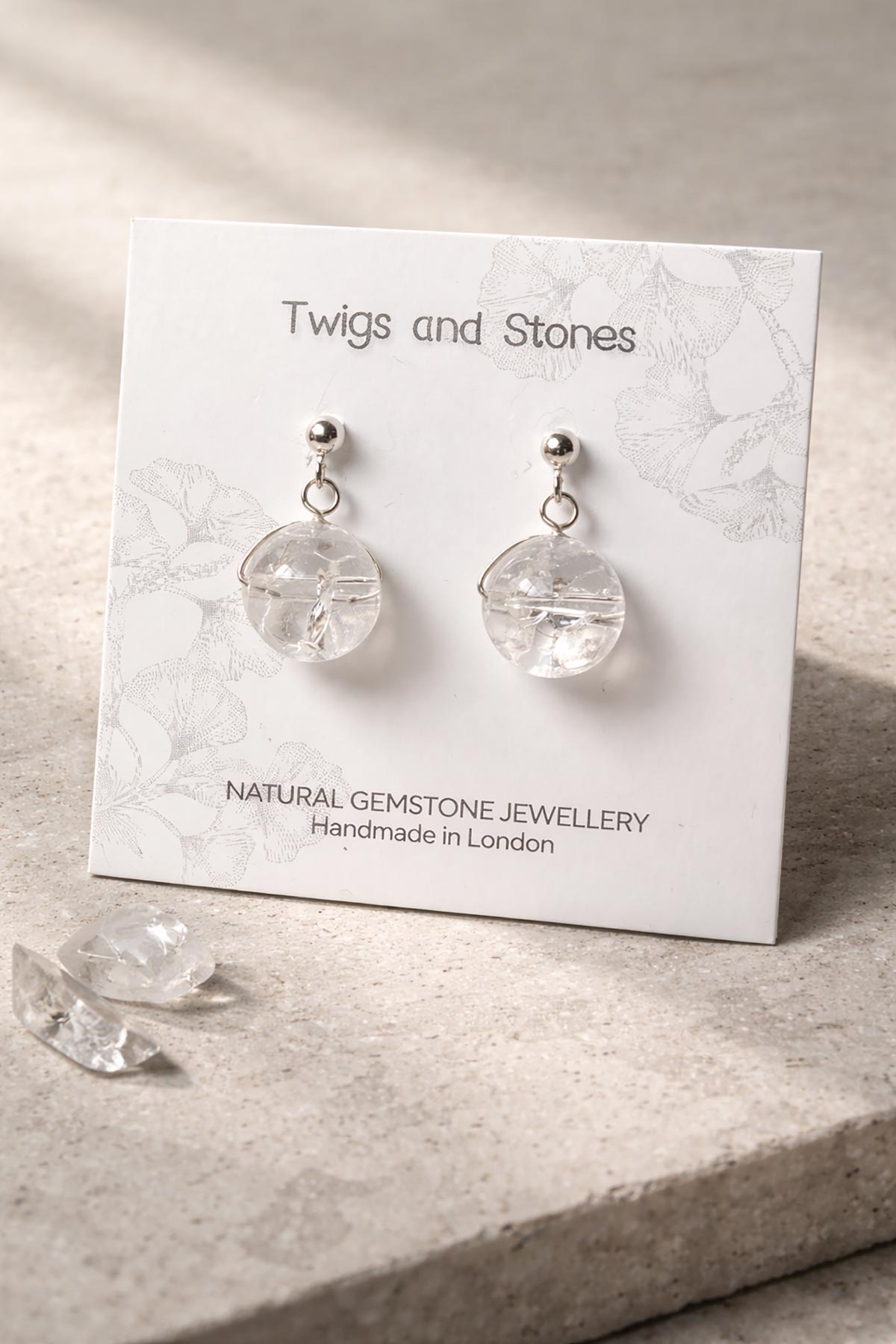 Twigs & Stones crystal quartz earrings in packaging
