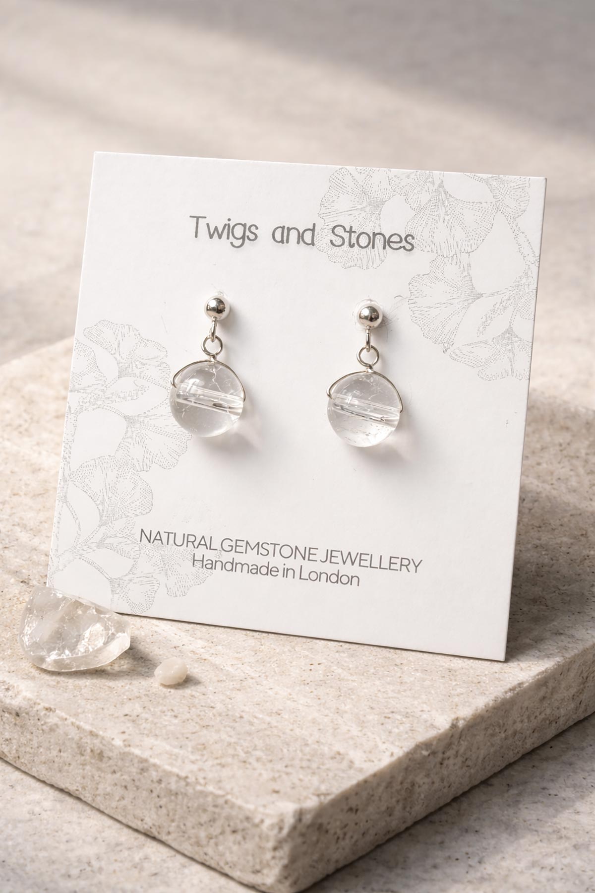 Close-up of crystal quartz stud earrings