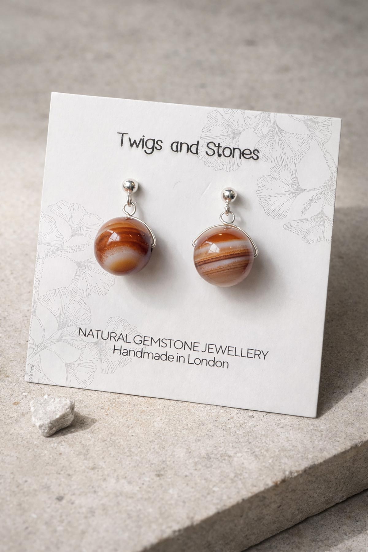Twigs & Stones golden brown agate earrings in packaging
