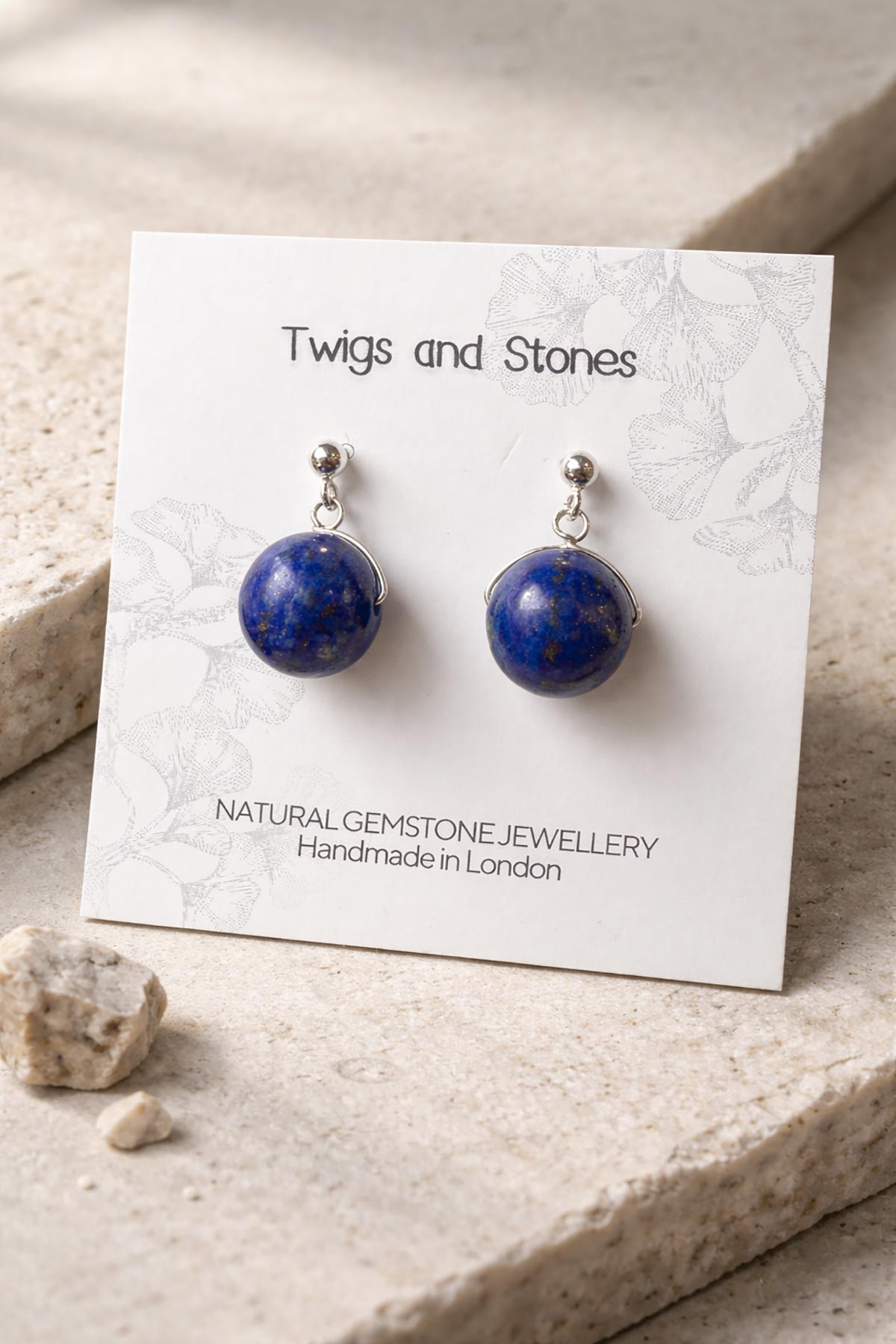 Twigs & Stones lapis lazuli earrings in packaging