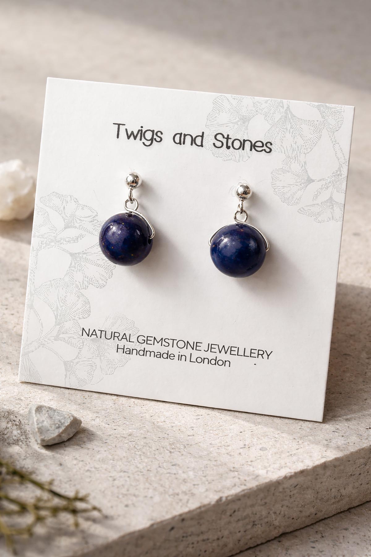 Close-up of lapis lazuli gemstone stud earrings