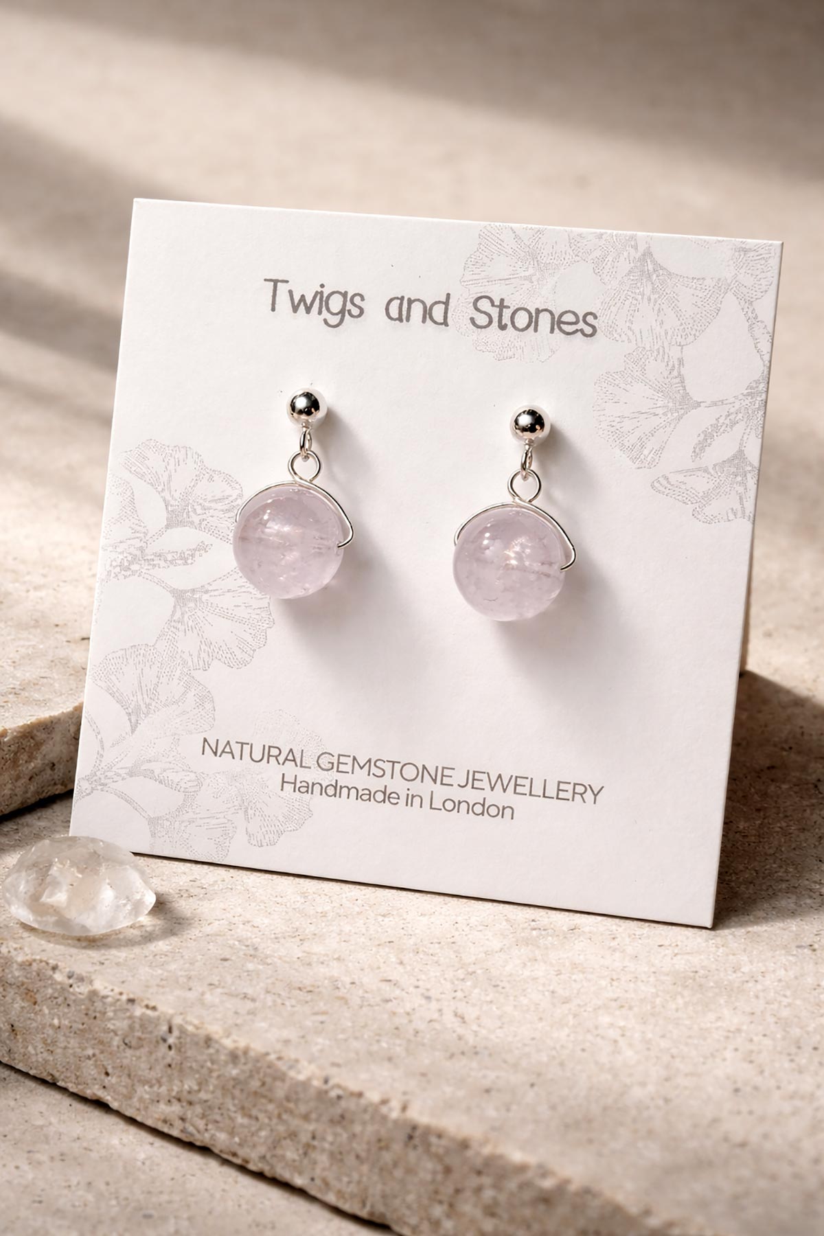 Close-up of lavender amethyst gemstone stud earrings