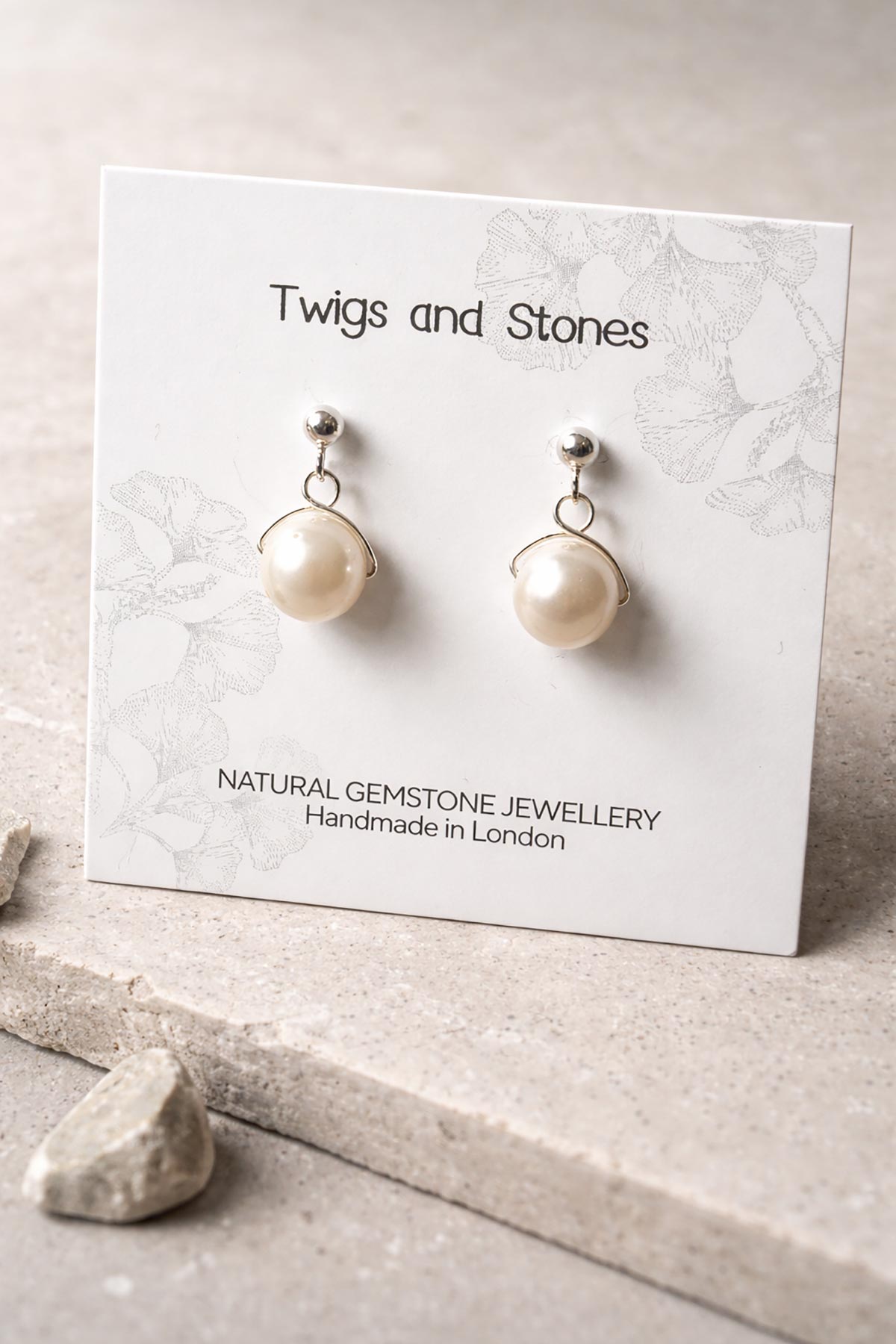 Close-up of pearl stud earrings