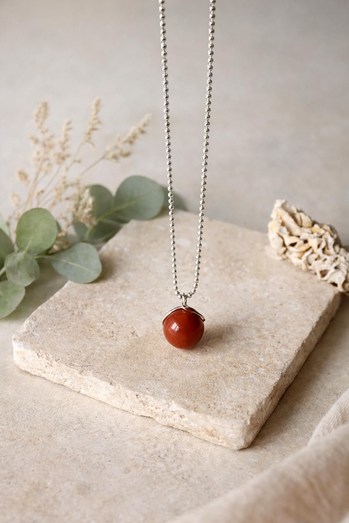 Red jasper pendant necklace by Twigs & Stones at Urban Wild