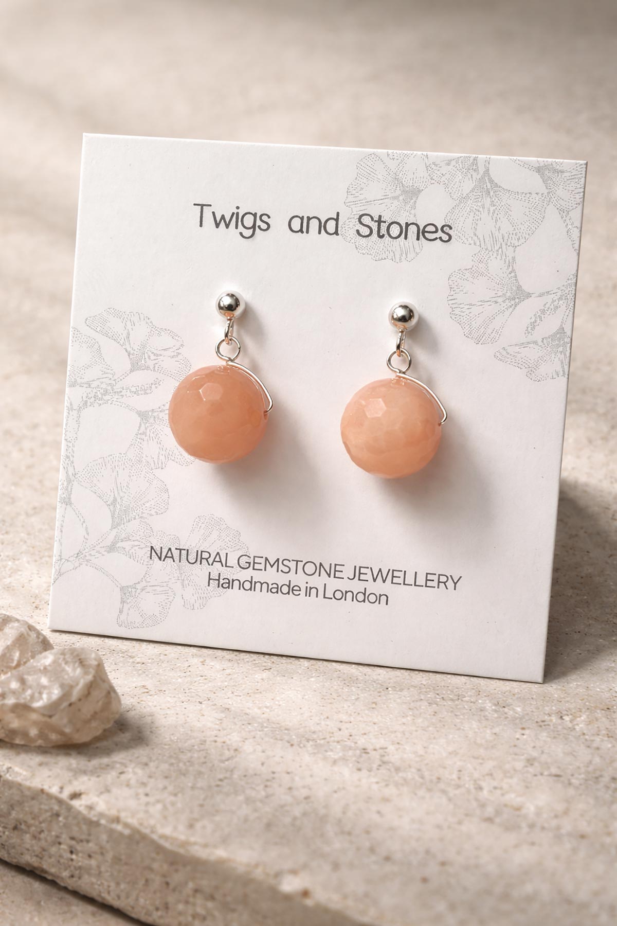 Close-up of sunstone gemstone stud earrings