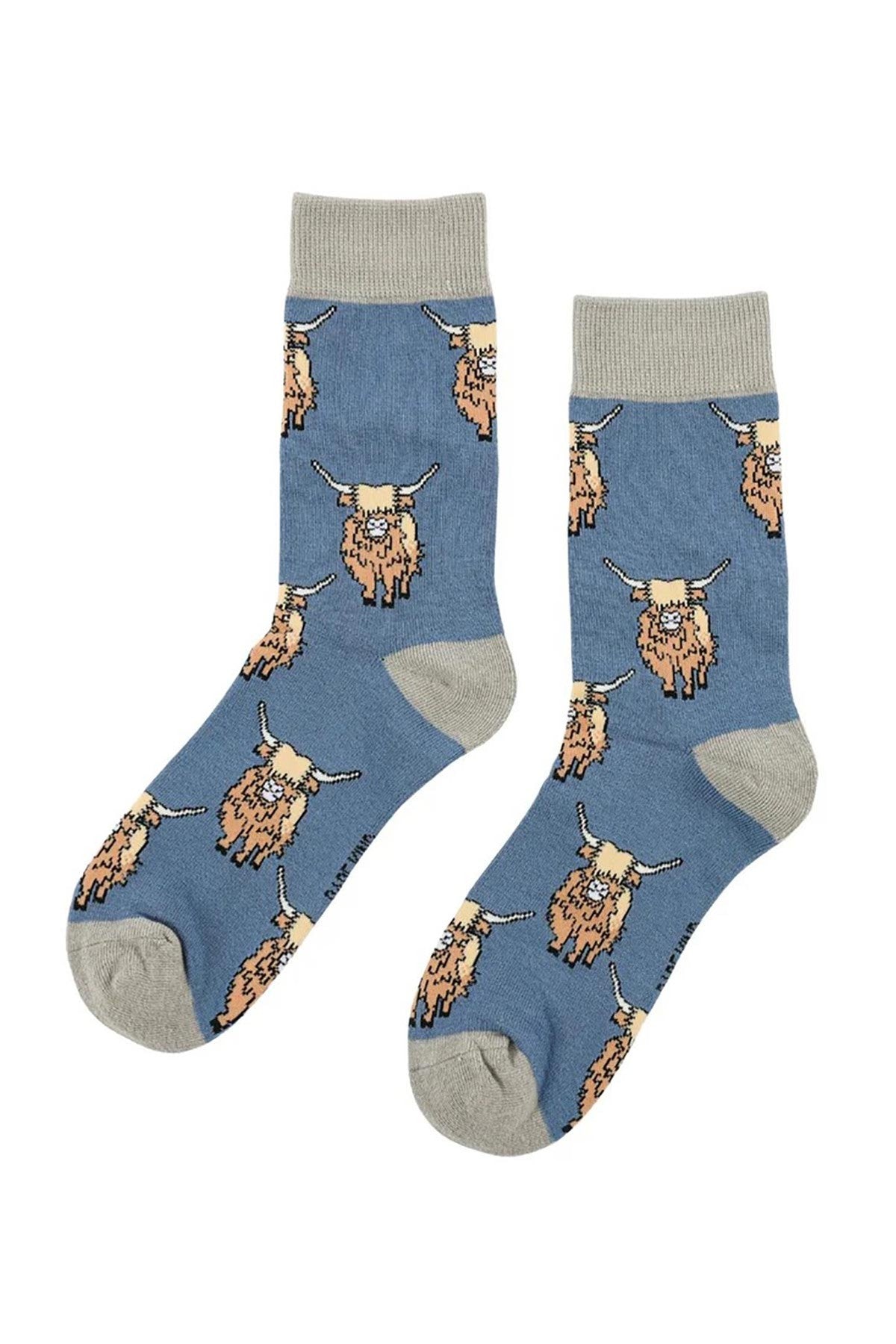 Pair of blue bamboo crew socks with highland cows and grey heel and toe — Urban Wild