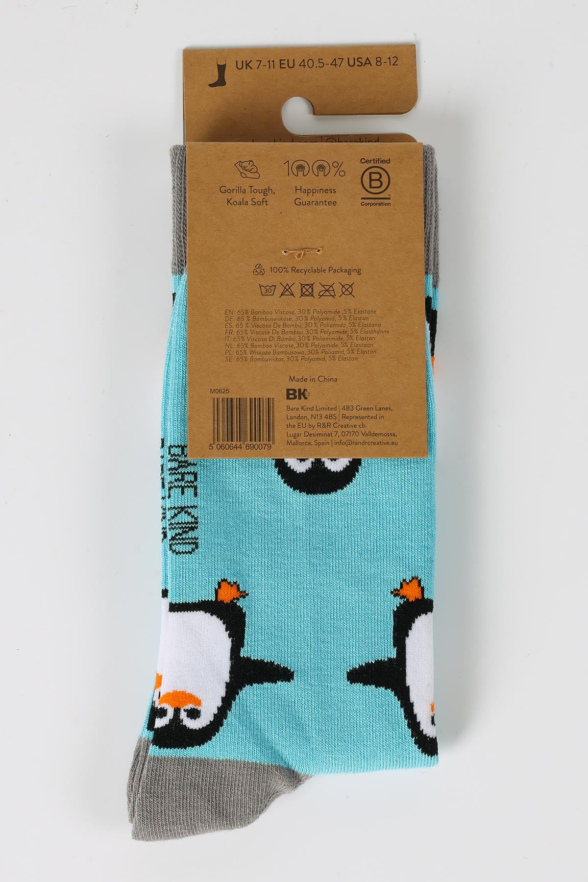Reverse of Save the Penguins bamboo socks showing fibre composition and care details Urban Wild