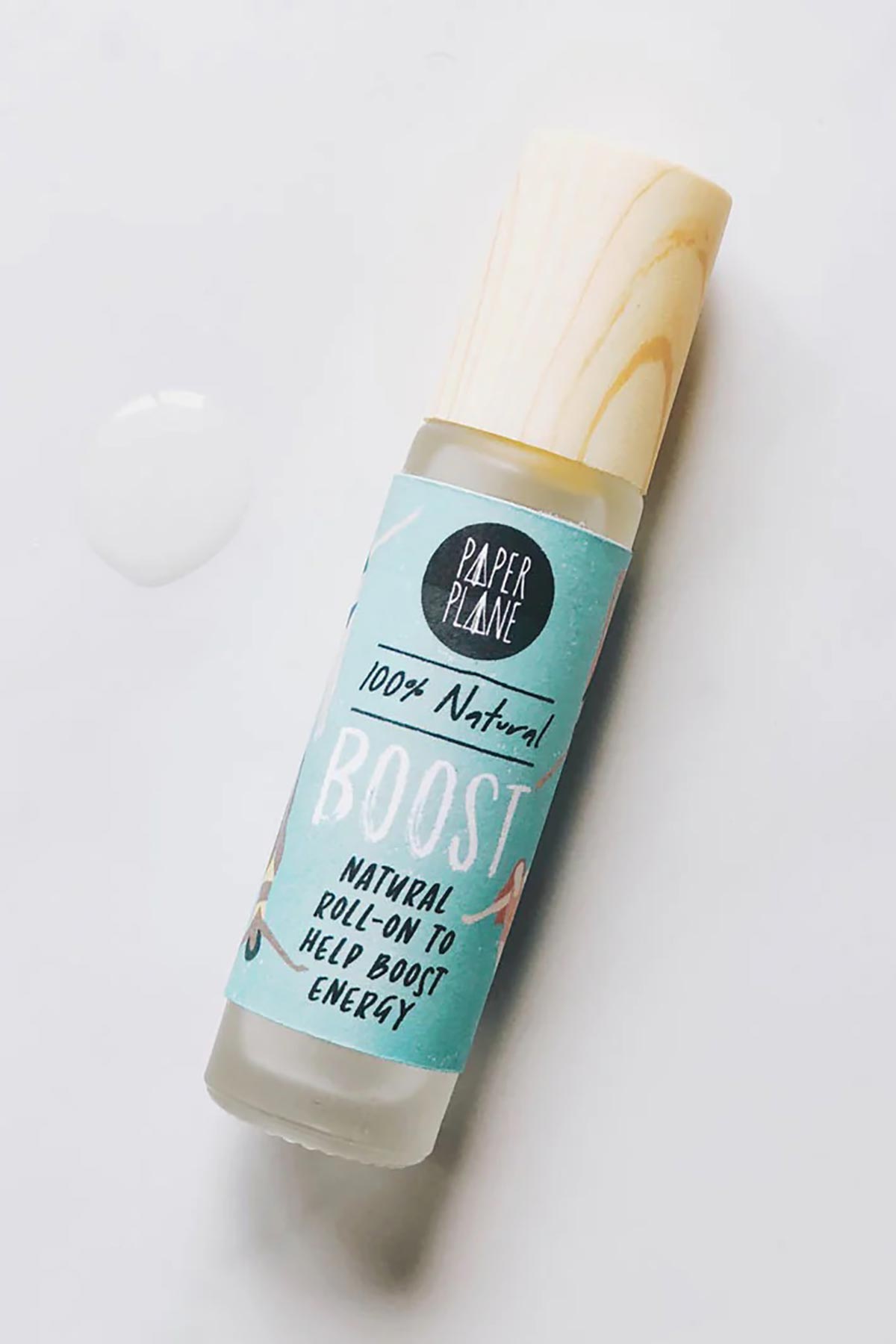 Boost natural energy pulse point roller oil flatlay with oil droplet — Urban Wild